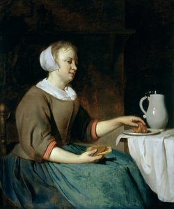 Retrato de una niña sentada en una mesa